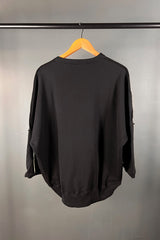 Tzusk Oversized Crow With a Scooped Hem